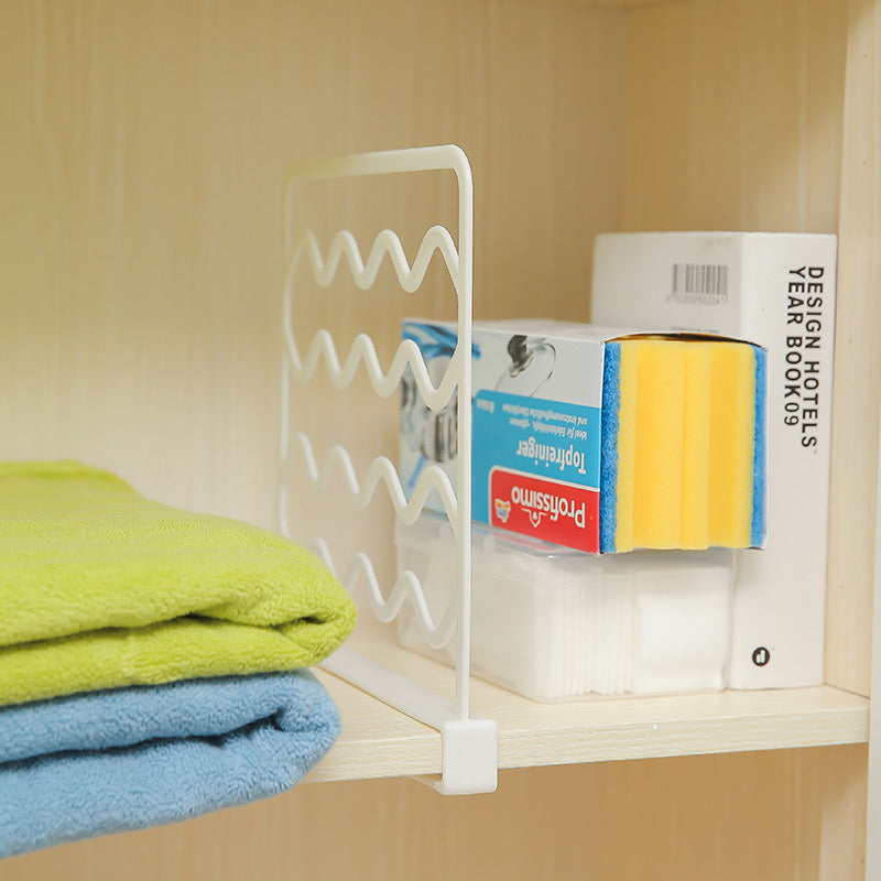 Wardrobe Separation Board installed on a rack to separately organize towels and dishwash scrubber 