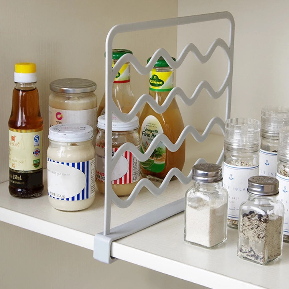 Wardrobe Separation Board installed on a rack to separately organize spices and sauces 
