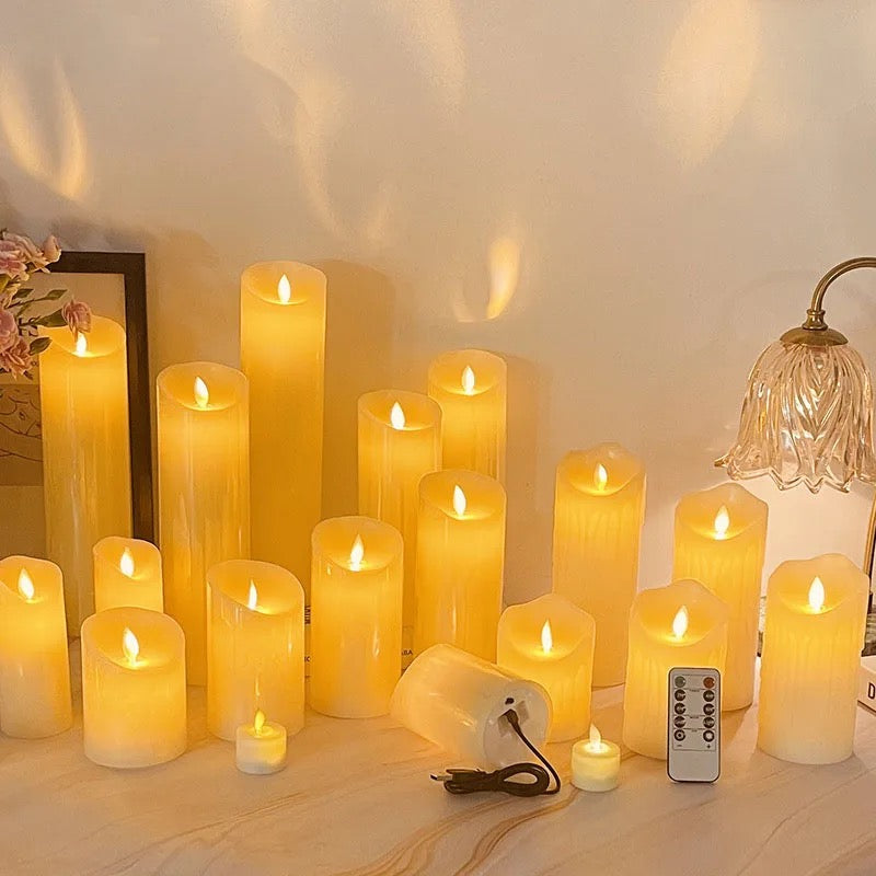 Large number of Flameless LED Candles along with it's remote control placed next to a lamp and a photo frame on a table