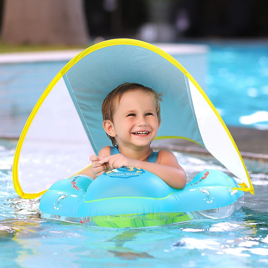 a baby swimming with help of Inflatable Baby Swimming Float