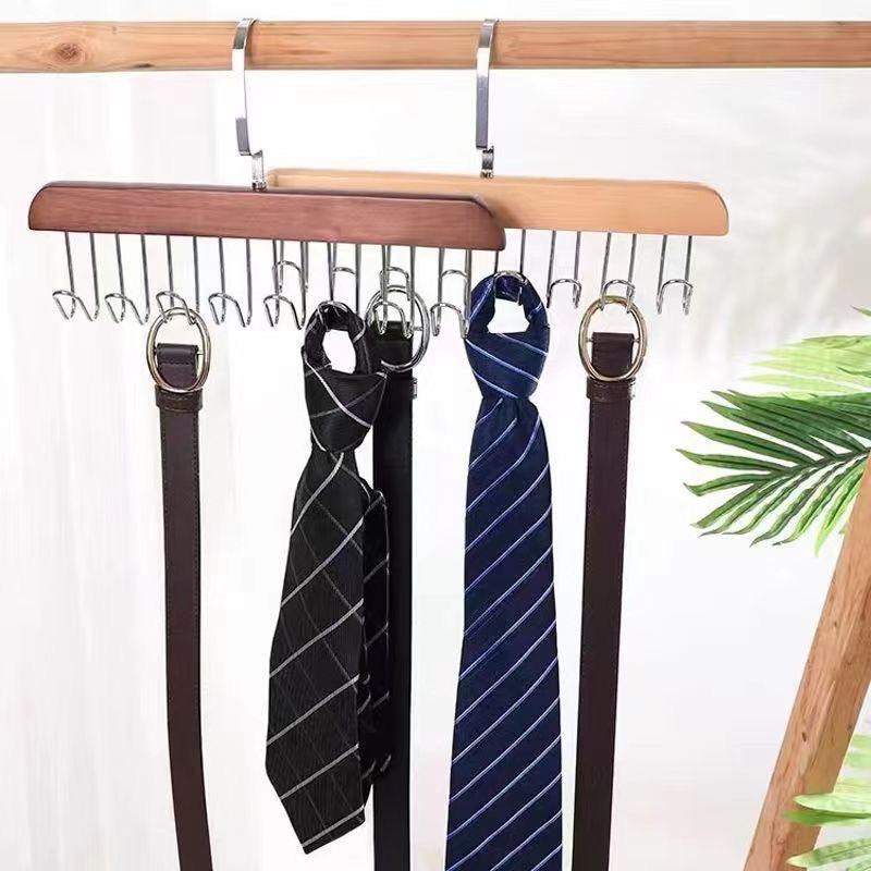A rack with clothes hanging on 8 hooks non-slip hanger, perfect for organizing your wardrobe.