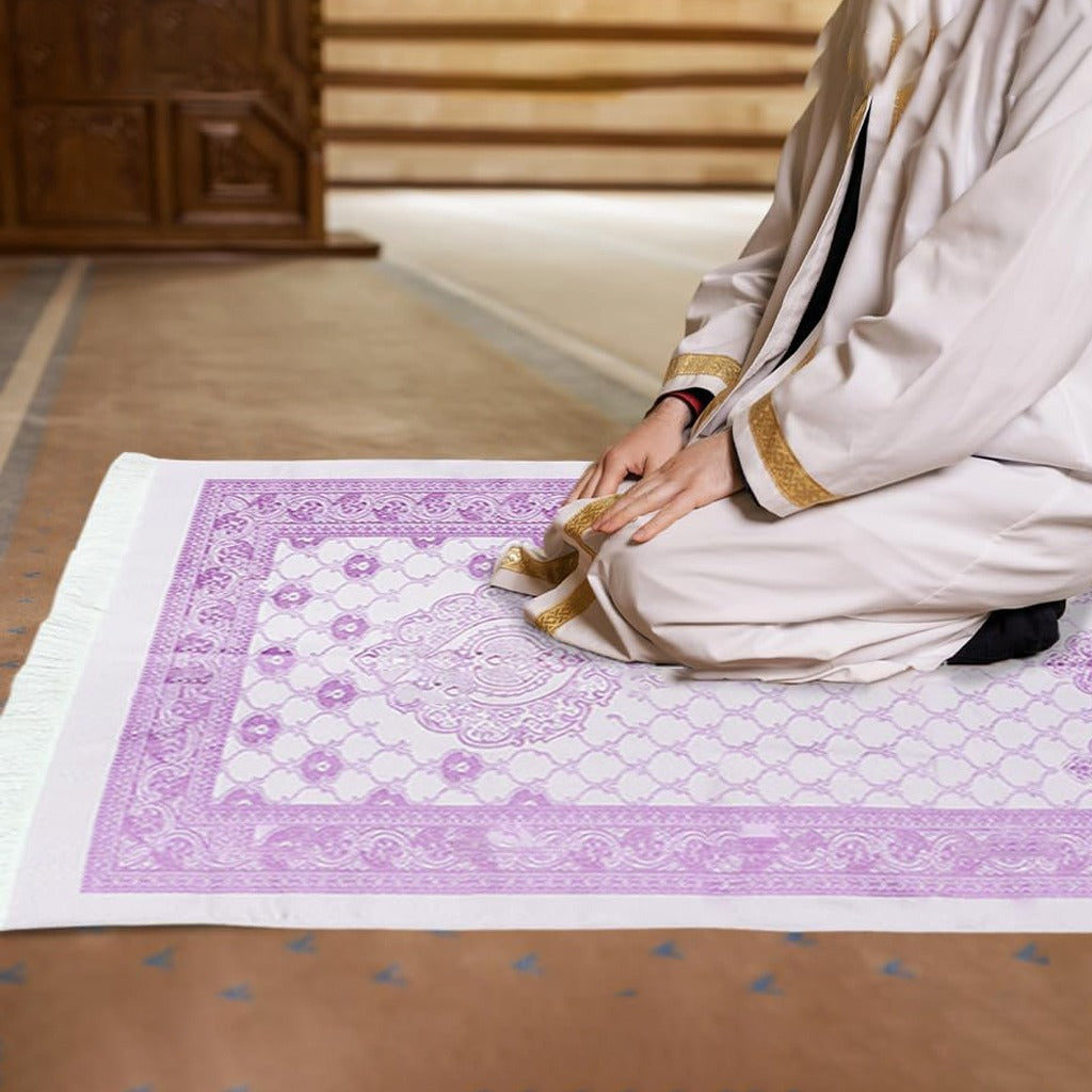 A Person is Praying in a Islamic Prayer Mat Set.