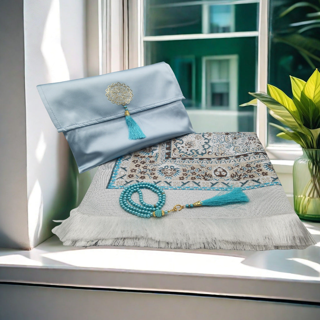 An Islamic Prayer Mat Set in Light Blue Color.