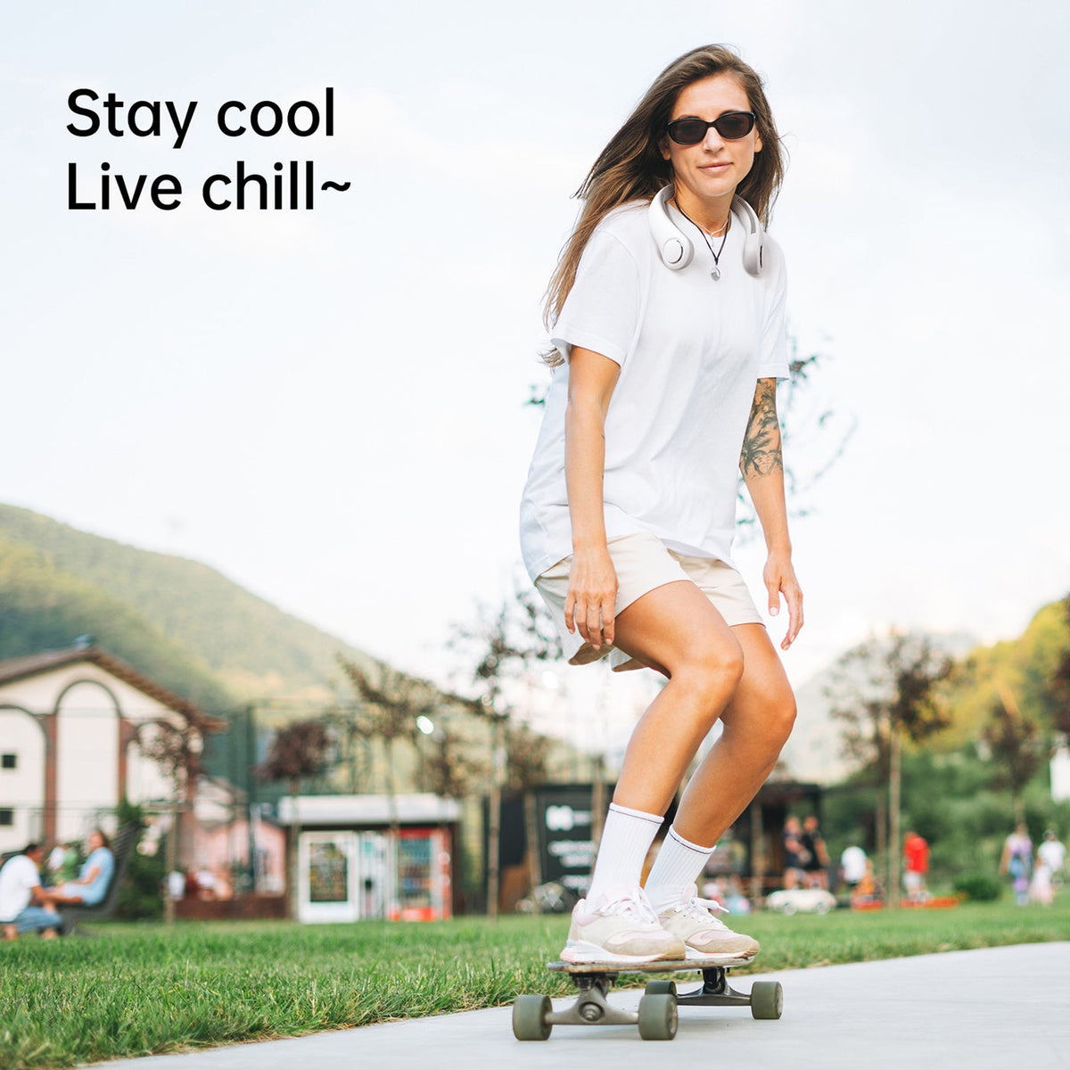 A Woman is Wearing Jisulife Neck Fan Life 3 While Skating.