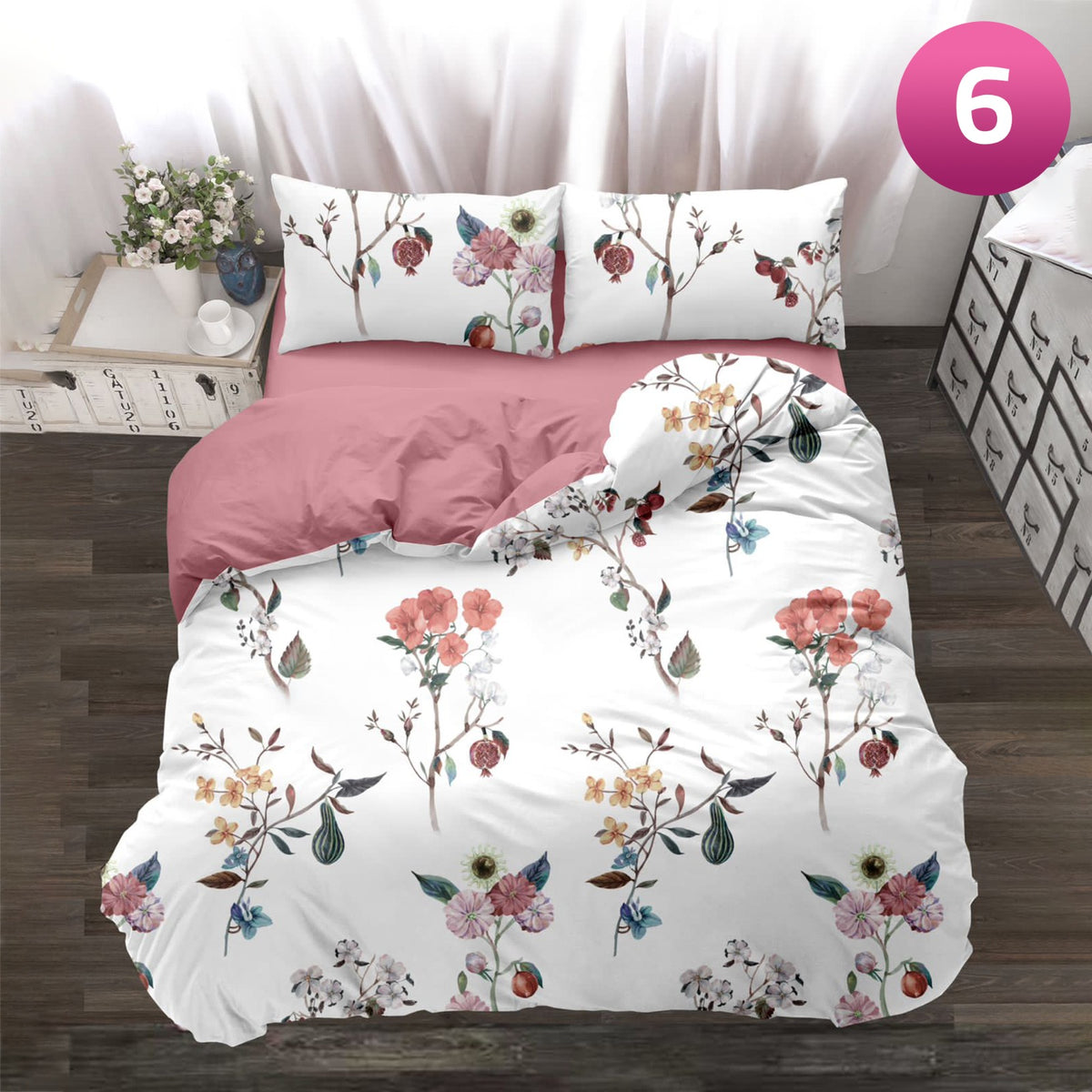 King Size Cotton Quilt Bedding Set on a bed with a pink pillow and white walls.
