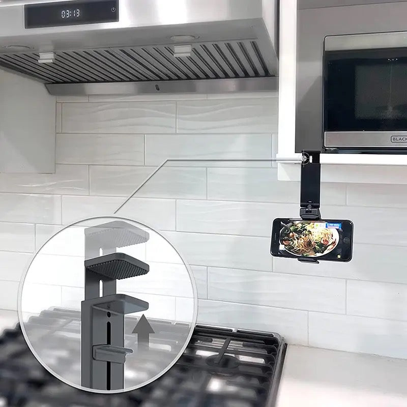 A Mobile Phone is Placed On Kitchen Using Universal Mobile Phone Mount Holder.