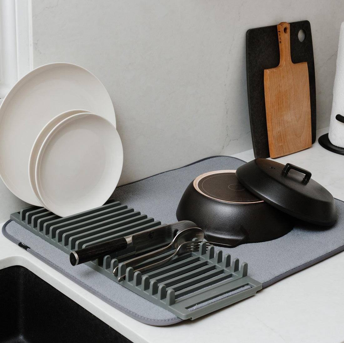 Plates are Organized in a Kitchen Dish Rack.