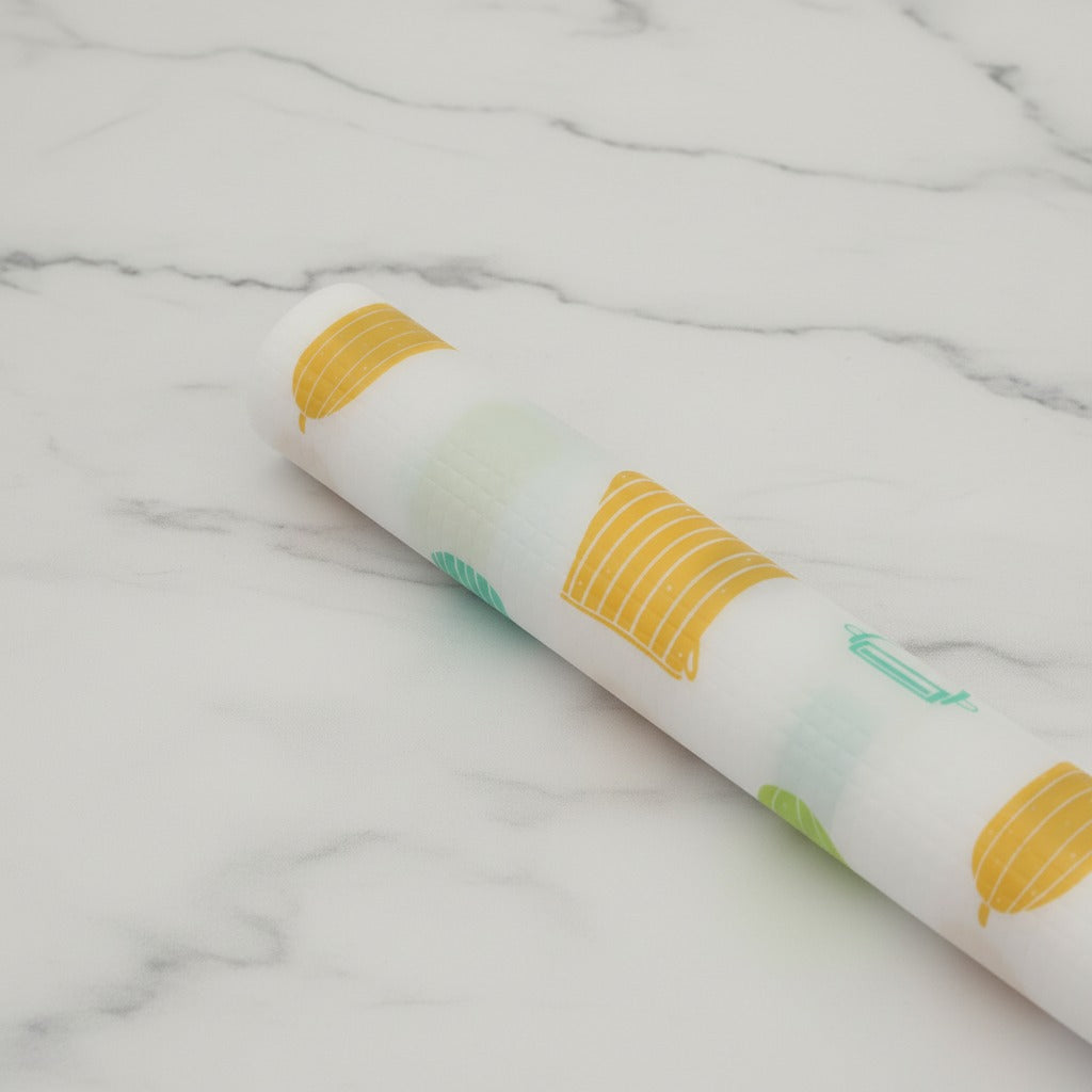 Roll of Kitchen Shelf Liner Mat on a marble surface