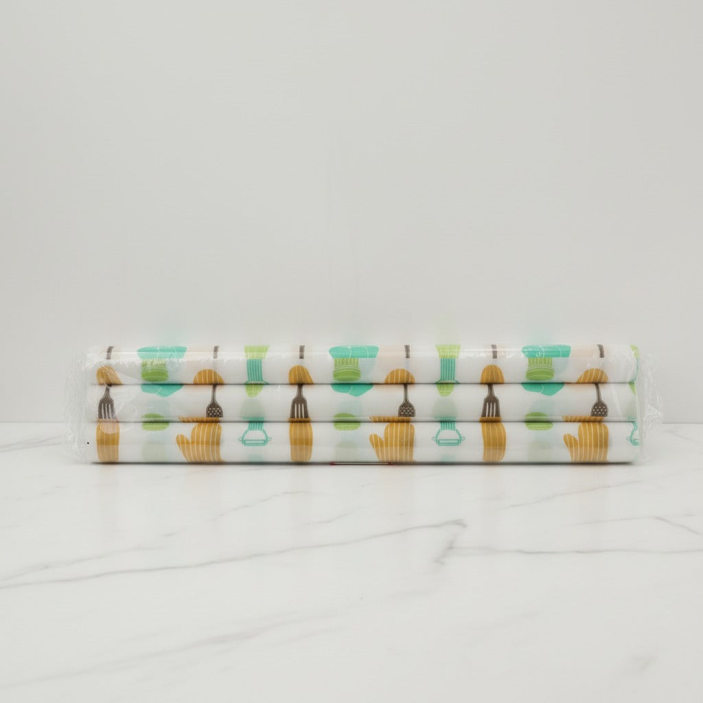 Three folded Kitchen Shelf Liner Mat on a white background
