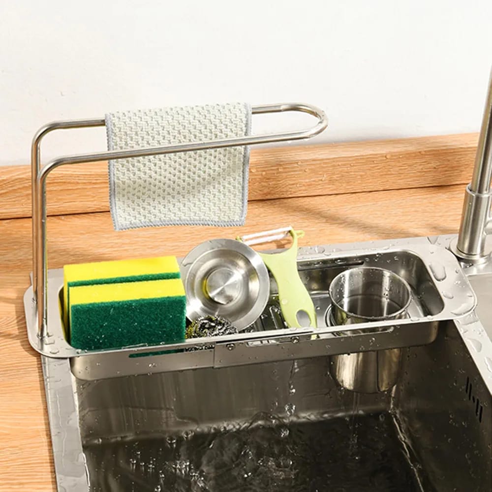Kitchen Sink Organizer Storage Drain Rack is Organized with Sponges and other kitchen accessories.