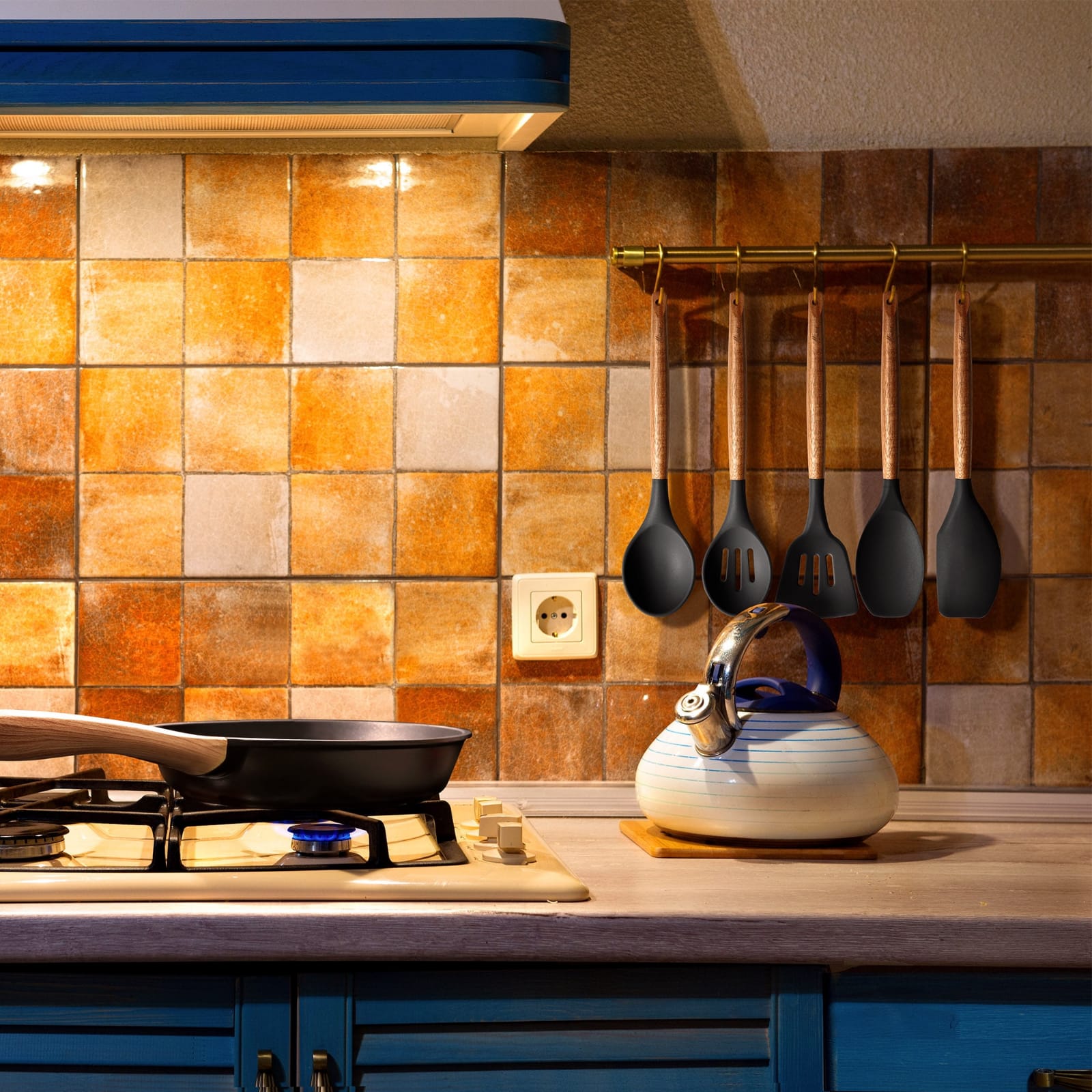 Kitchen Spoon Utensil Set is Hanged in a Kitchen.