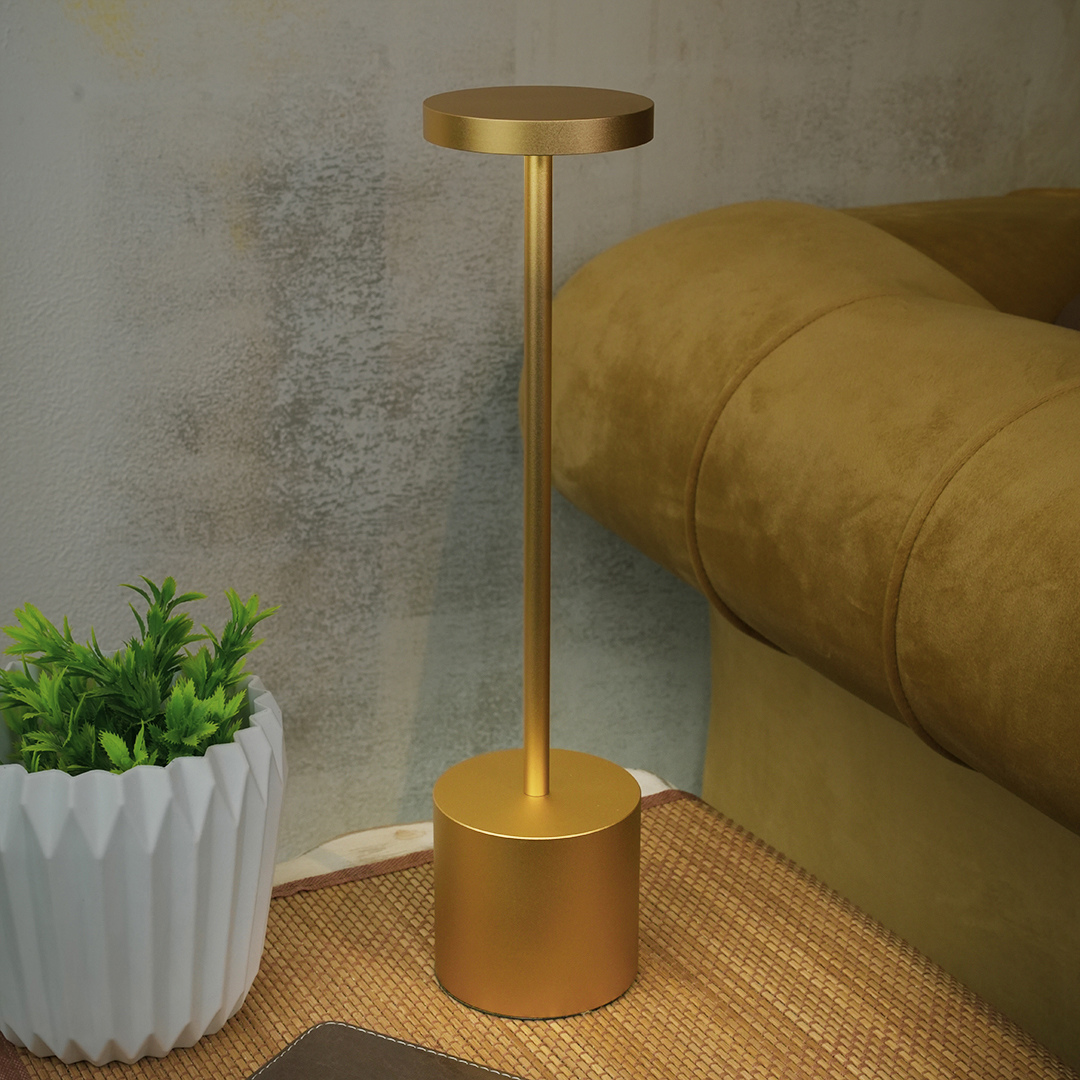 LED Desk lamp on a wooden stand next to a sofa
