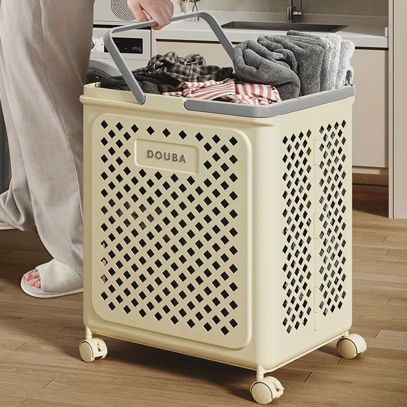 A Person is Pulling Large Capacity Laundry Basket With Clothes.