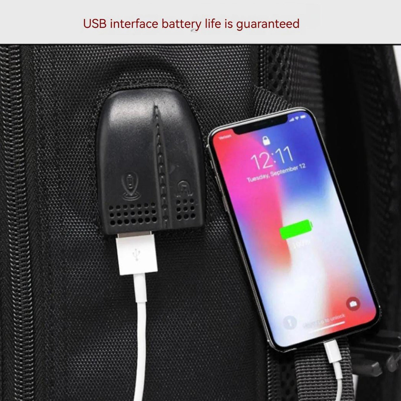 Charging Mobile Phone in the USB Port Of Large Capacity Travel Backpack.