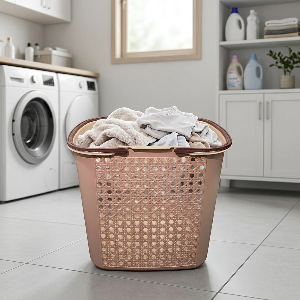 Laundry basket with clothes in a laundry room with washing machine and shelves.