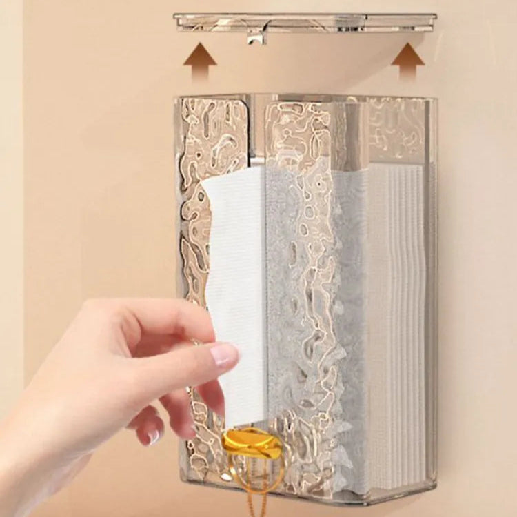 A hand taking a Tissue From Tissue Organizer Box mounted in wall
