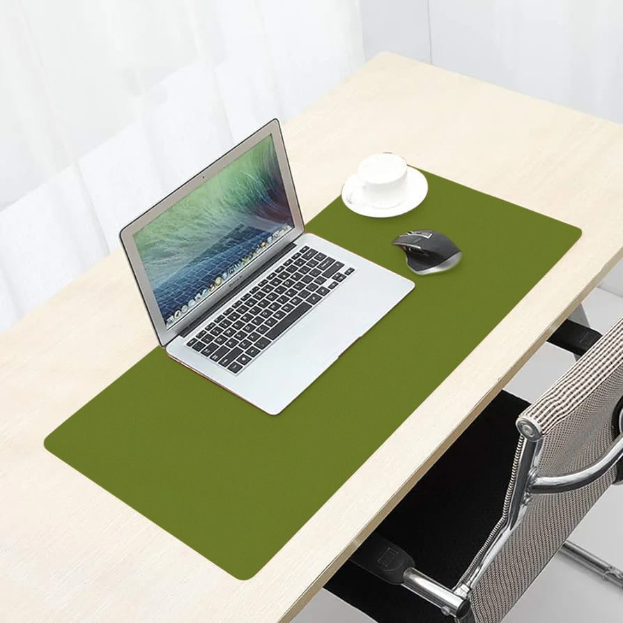 Laptop Is Placed On Large Light Green Laptop Desk Mouse Mat.