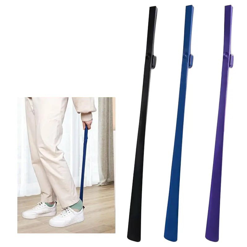 A Person is Wearing Shoe Using Long Handle Shoe Horn.