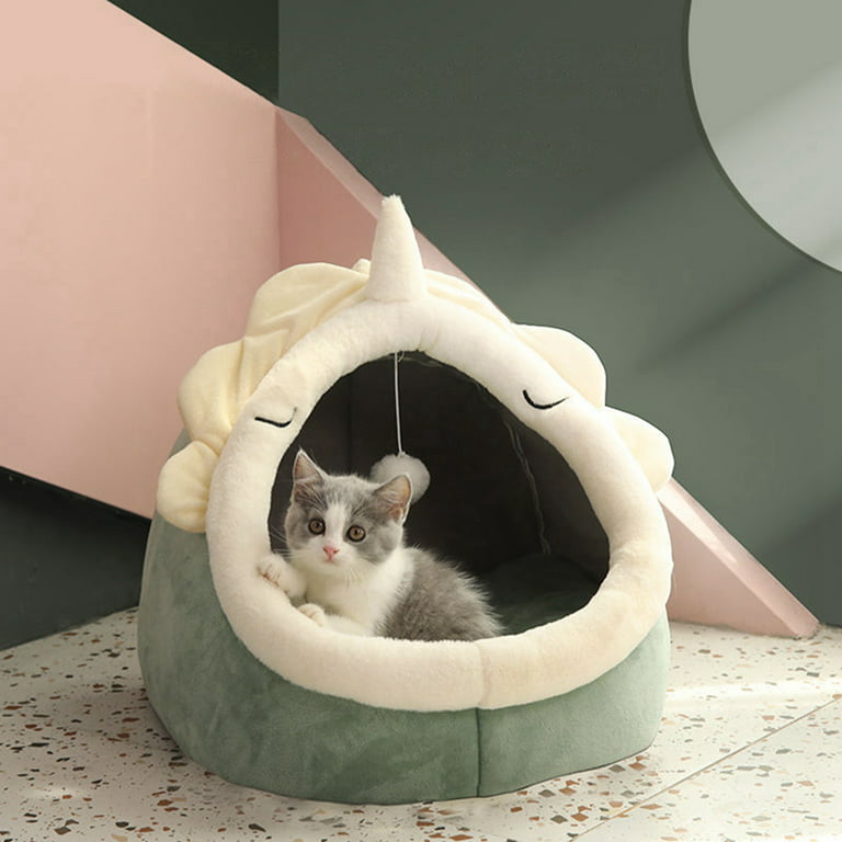 A Cat in a Cat Bed Lounger Cave.