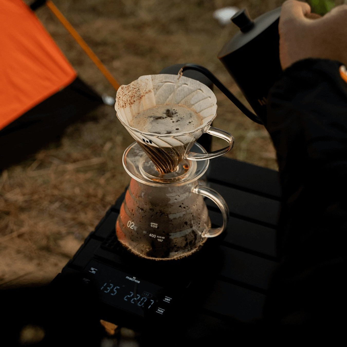 A Person is Filtering the Coffee Using Macnoa Specialty Coffee Filter.