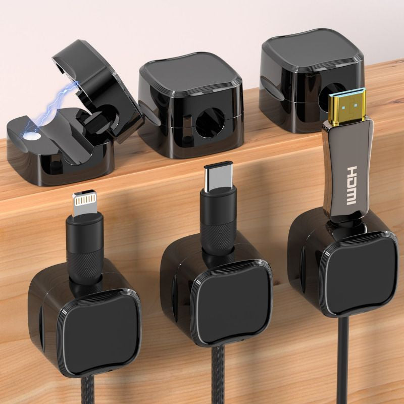 Magnetic Cable clips securely hold charging cables on desk edges.