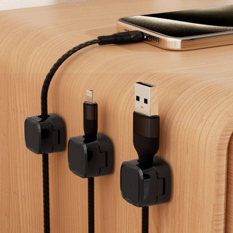 Magnetic Cable clips securely hold charging cables on desk edges.