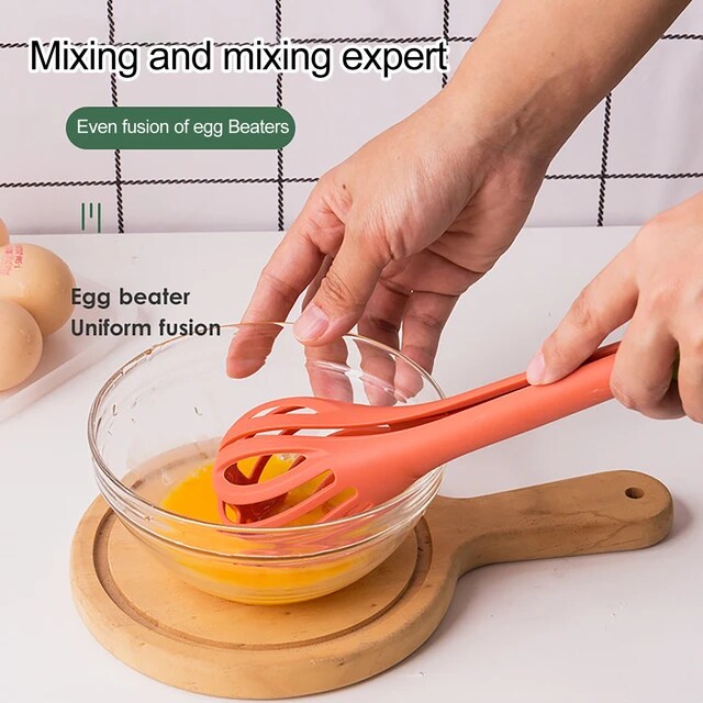 A Person Beats Egg Using  Manual Kitchen Whisk.