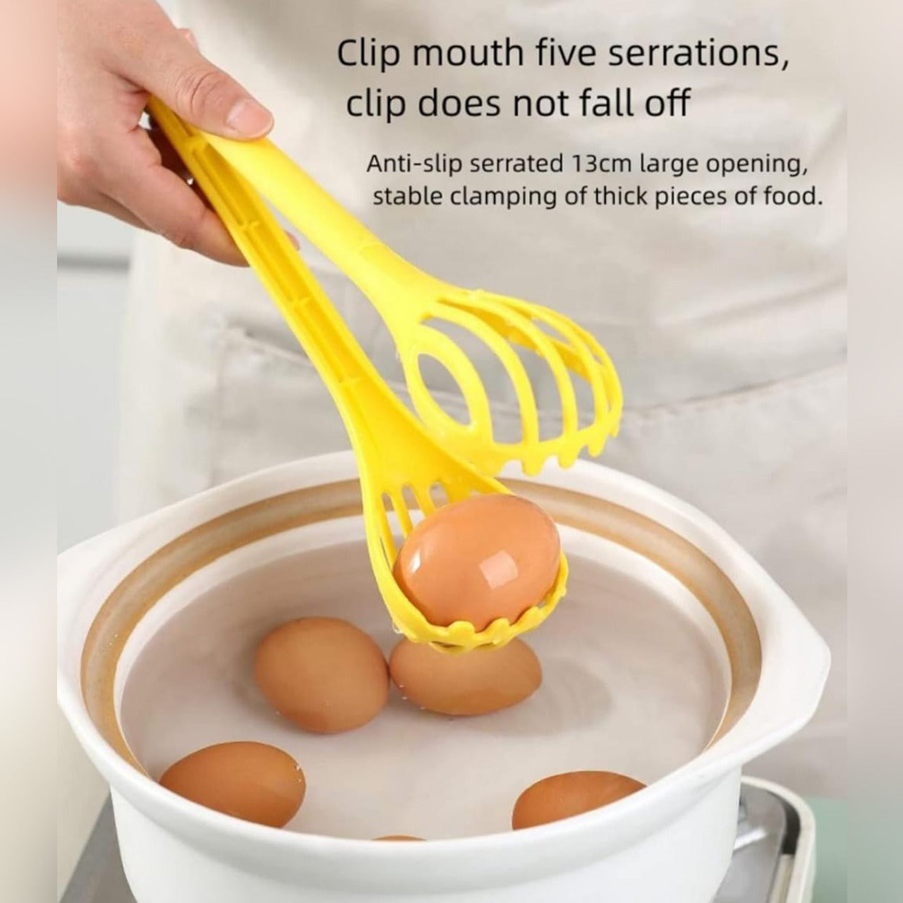 A Person Picks Egg Using A Person Beats Egg Using Multi-purpose Manual Kitchen Whisk.