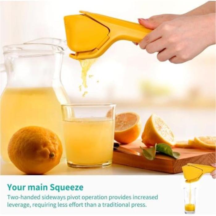 A Person is Squeezing Lemon Using Manual Lemon Fruit Squeezer.