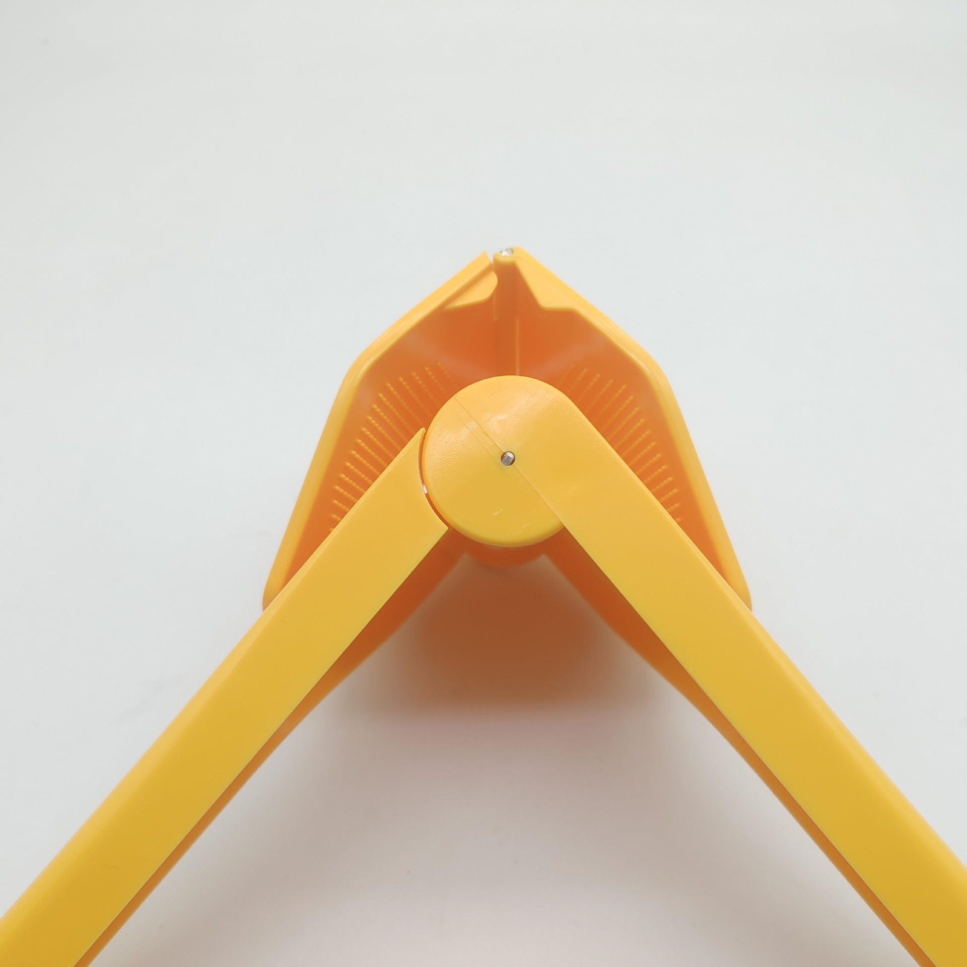 Manual Lemon Fruit Squeezer in Yellow Color.