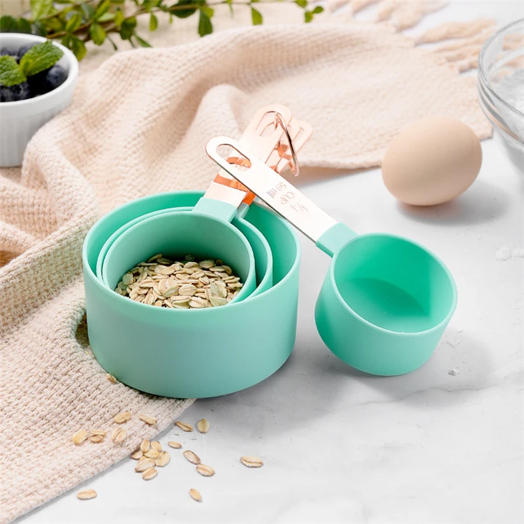 Measuring Cups and Spoons Set With Food Items.