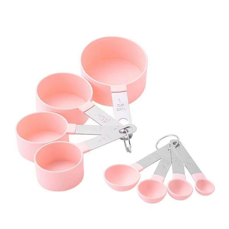 Measuring Cups and Spoons Set in Pink Color.