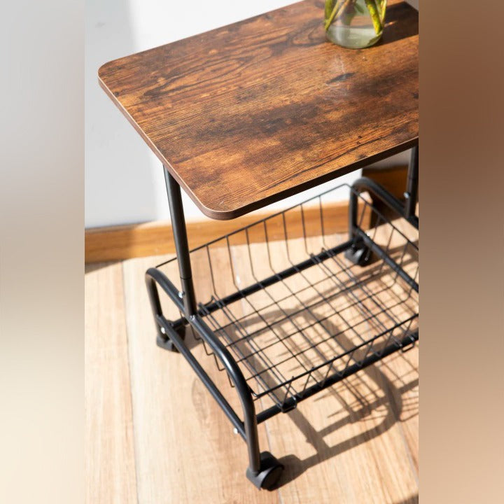 Wooden table with metal stand on a wooden floor