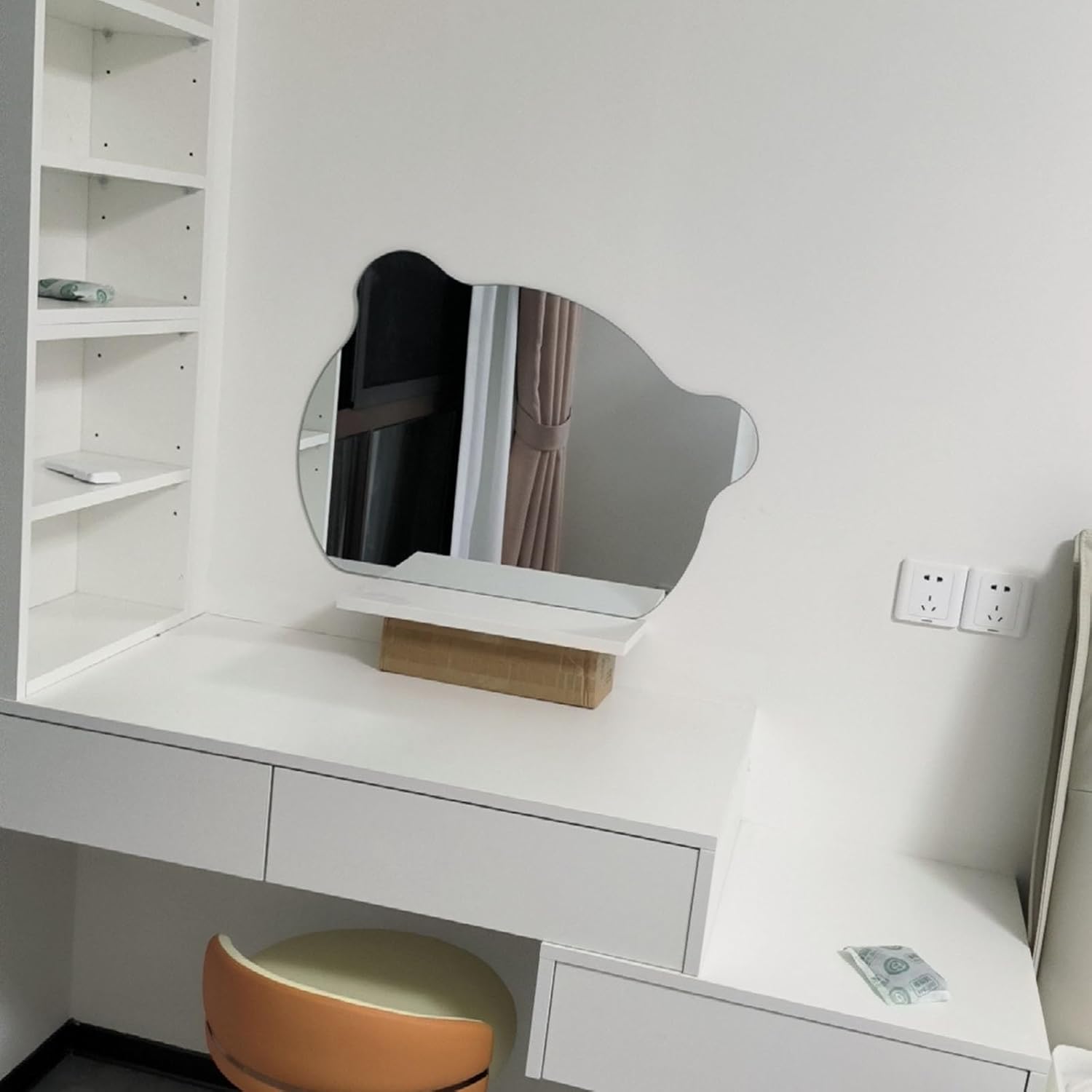 A Modern LED Bathroom Mirror is Kept on a Dressing Area.
