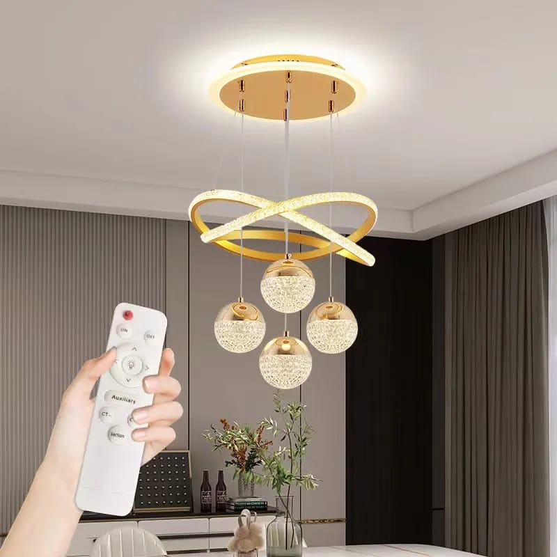 A Person is Controlling Modern Chandelier Pendant Indoor Lamp With Remote Control.