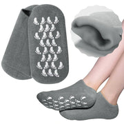 Moisturizing Spa Gel Socks with non-slip patterns on a white background