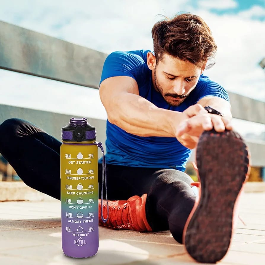 A Man is Doing Workout and Motivational Drinking Water Bottle is Placed Beside Him.