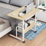 Movable Computer Laptop Table Desk is Placed Near Bedside.