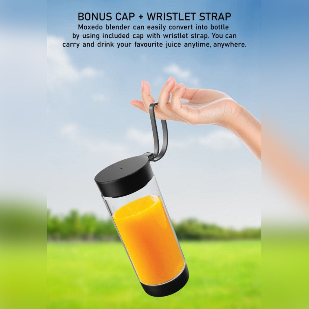 Someone is Holding Moxedo Frutiva Rechargeable Portable Juicer Blender.