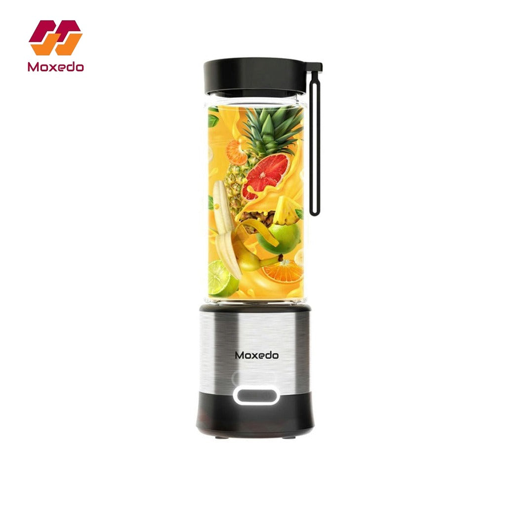 Moxedo Frutiva Rechargeable Portable Juicer Blender with Juice in Making.