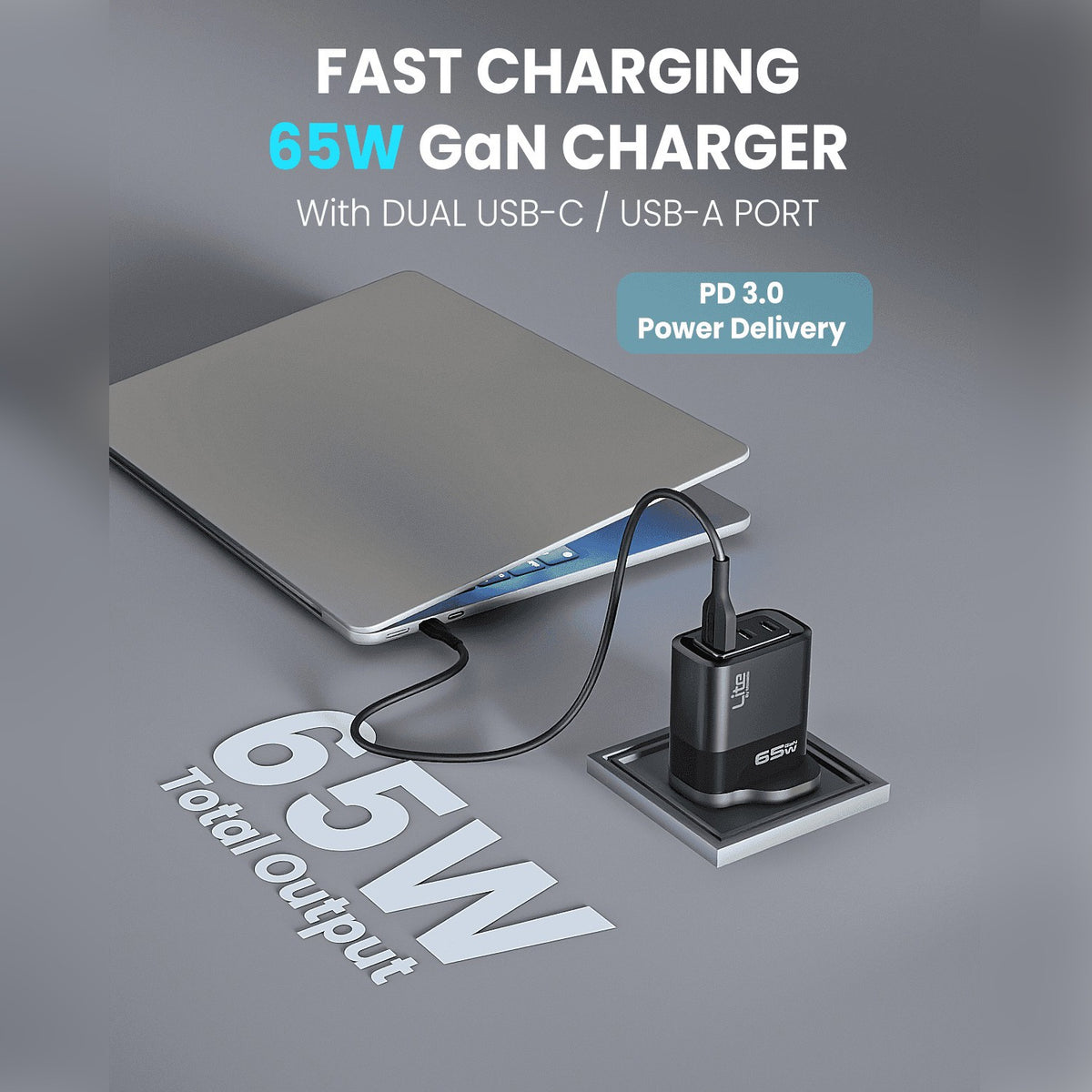 A Laptop is Connected to Moxedo Lite 65W GaN Charger.