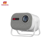 Moxedo Optivus Smart Android Projector with gray textured front and white sides on a white background, featuring the Moxedo brand.