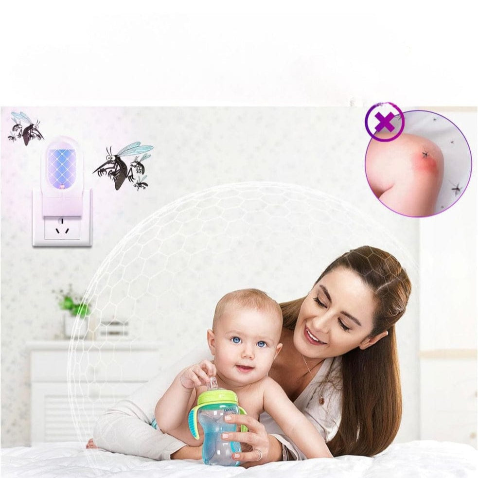 A Women is Protecting Her Baby From Mosquitoes Using Moxedo Plug- In Flying Insect Trap, Indoor Insect Trap UVA Light.