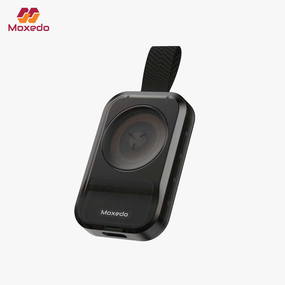 A Moxedo Portable Wireless Magnetic Watch Charger with a carrying strap, shown at an angle on a light gray background with the Maxedo logo in the top-left corner.