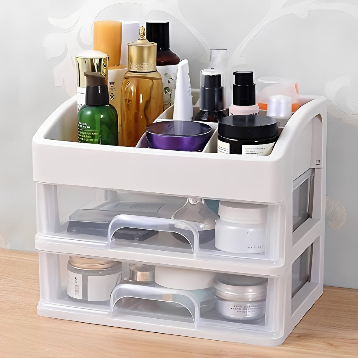 White cosmetic organizer with various skincare products on a wooden surface.