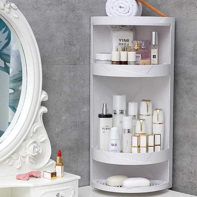 360° Rotating Bathroom Corner Storage Shelf placed in the bathroom with some items