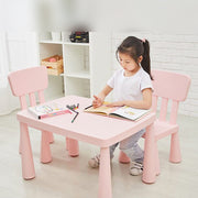 A Girls Studying in a Multi-Purpose Kids Table and Chair Set.