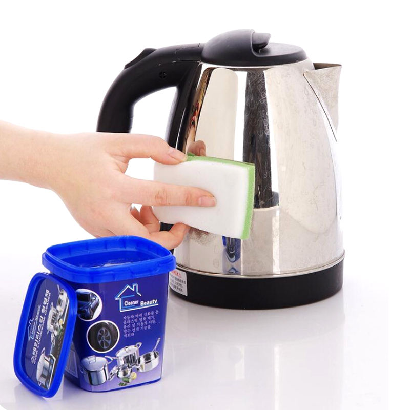 Someone cleaning a kettle with the help of multi-purpose decontamination paste