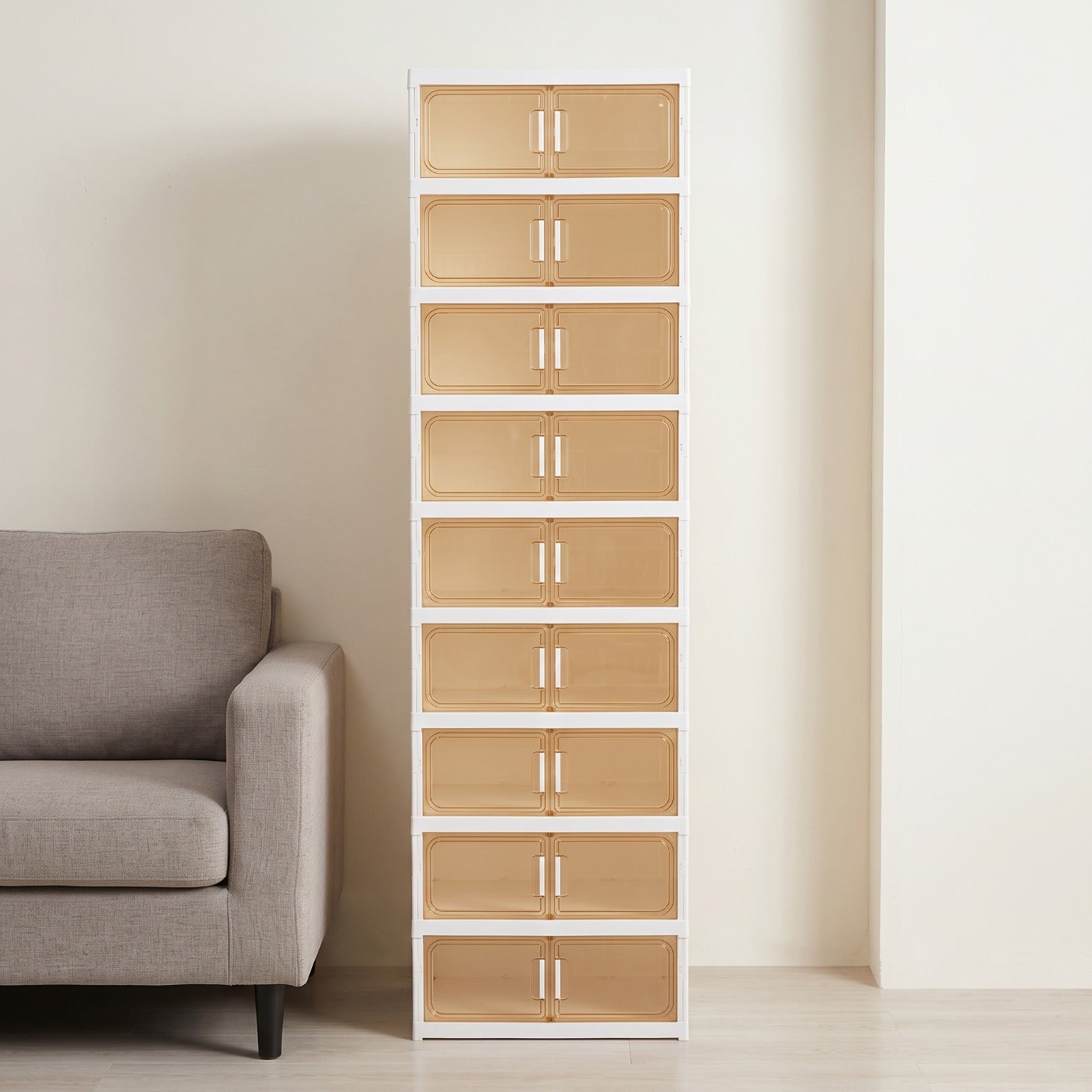 Multi-Tiered Shoe Storage Cabinet Beside a Sofa Set.