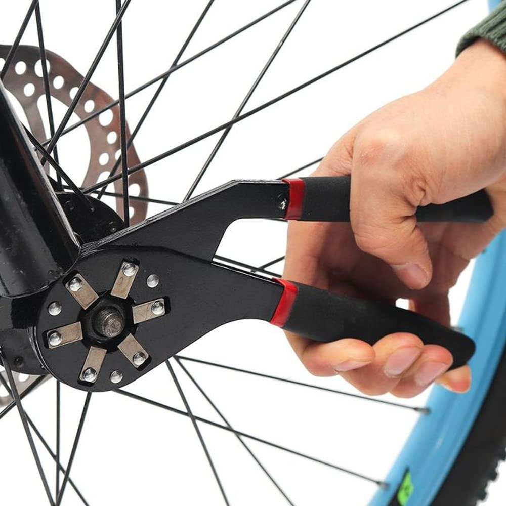 Someone is using the 6 Inches Universal Magic Wrench, a multifunctional bionic adjustable hexagon spanner, on a bicycle